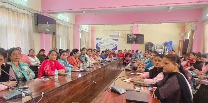 Women members of self-help groups learn the tricks of digital business