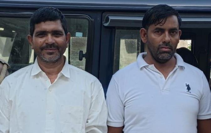 Staged a fake shooting incident to exact revenge on the village head over an election-related feud.