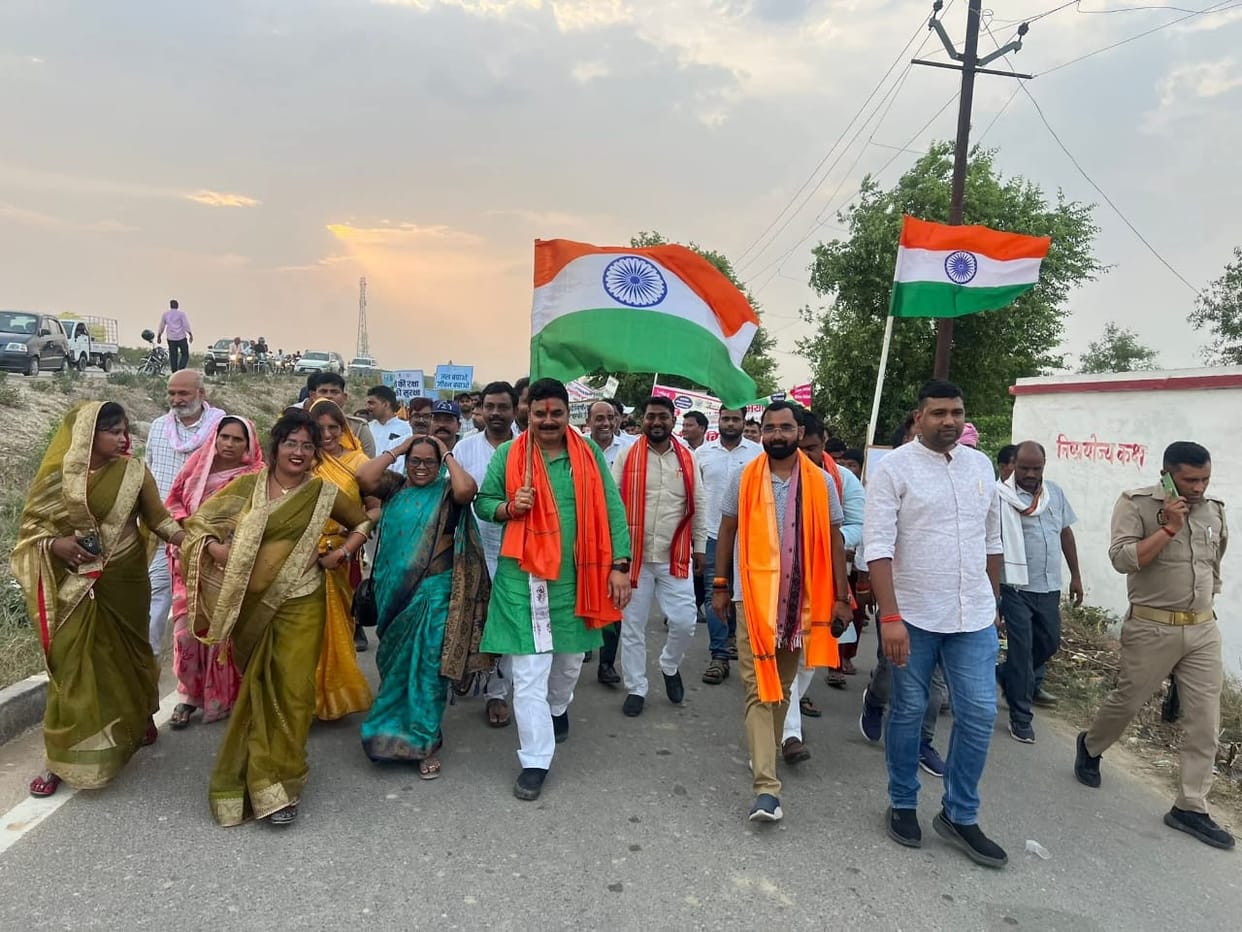 BJP members took out a foot march and highlighted the government's achievements.