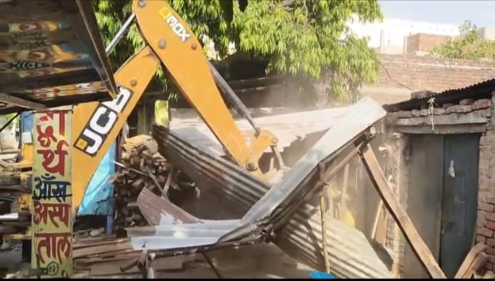 Encroachment removed from the committee's land.