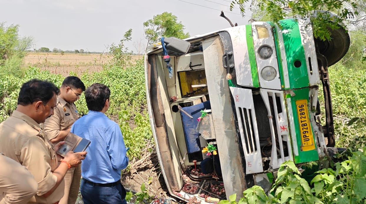 Bus overturns into a ditch near a culvert under construction; 12 passengers injured.