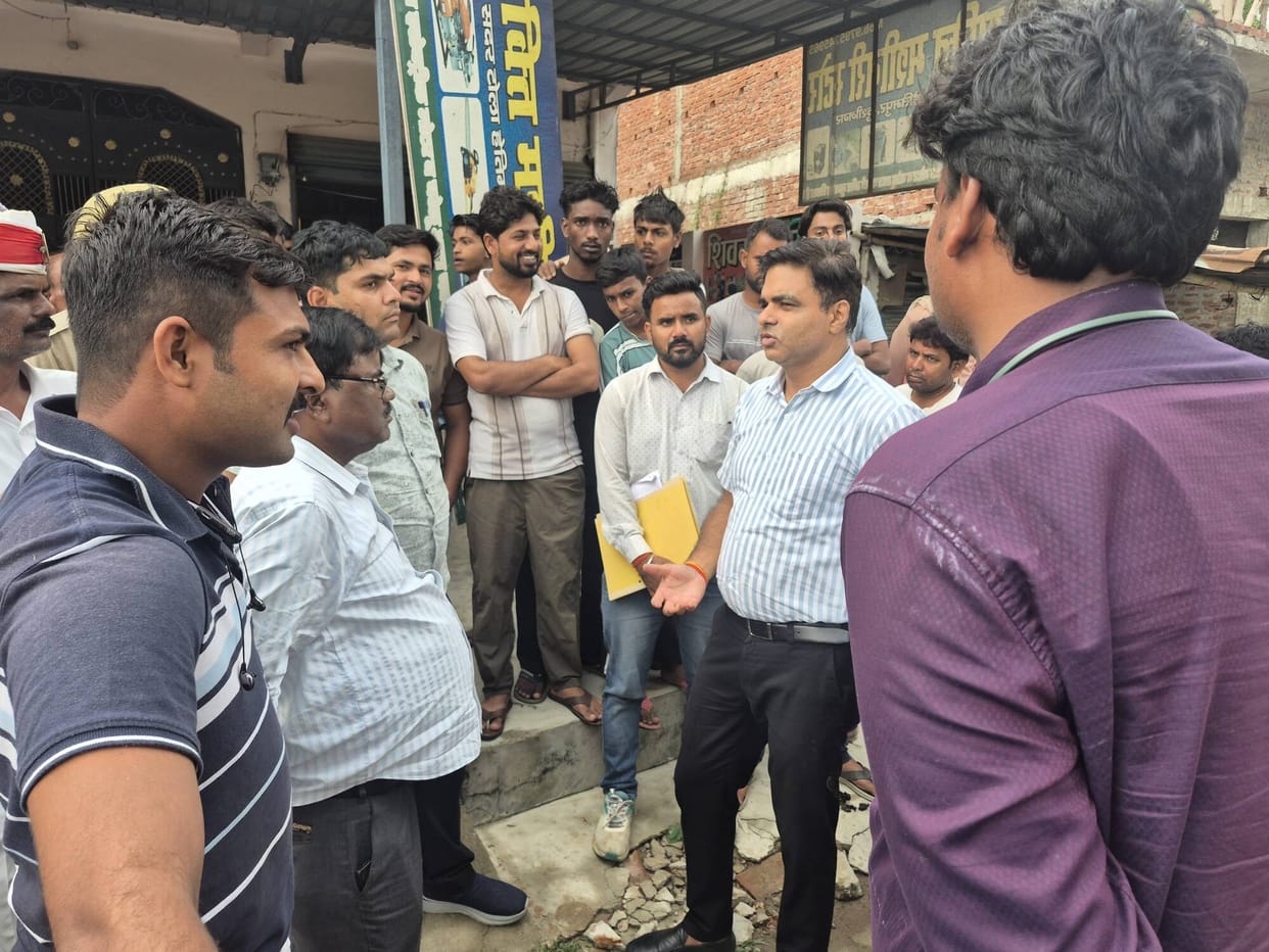 Villagers protest demanding compensation, halt work.