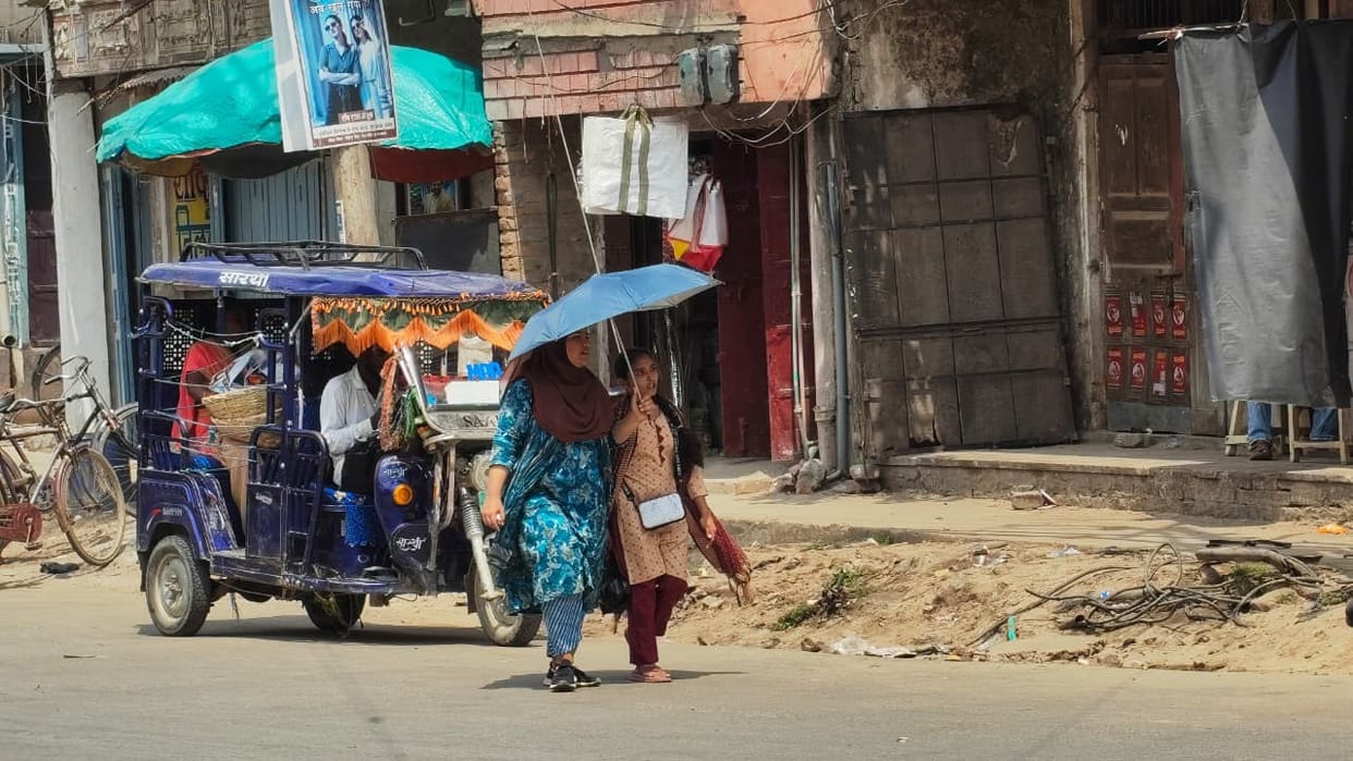 Temperature hits 40; people reel under the heat.