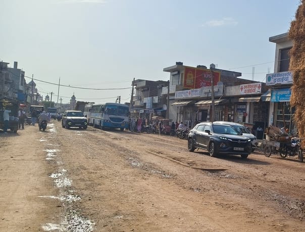Road construction proceeding at a snail's pace; residents and shopkeepers distressed.