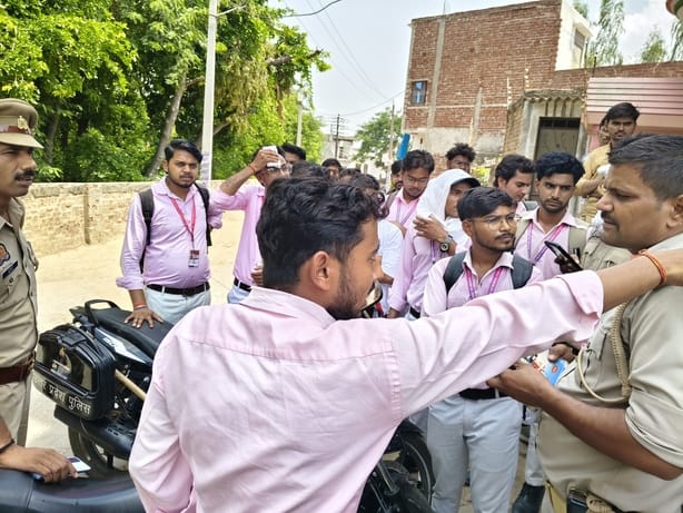 Nursing college students beaten with belts and held at gunpoint.
