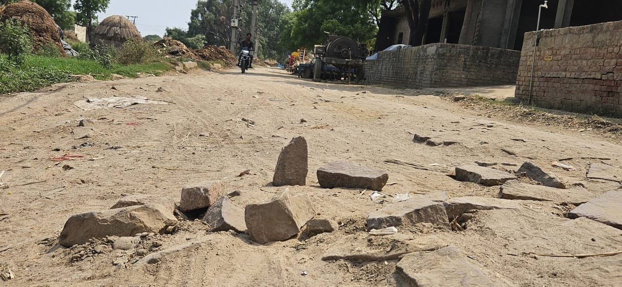 Every stone on the road rises up to tell the tale of its wretched state.
