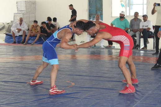 Sweating it out for the wrestling competition.