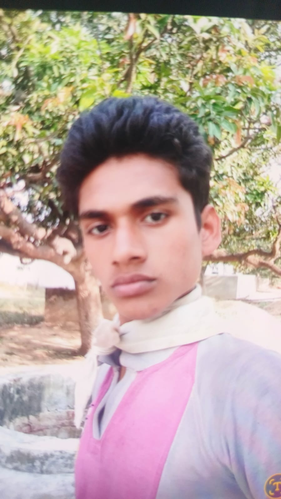 Truck runs over young man on bike; he dies.