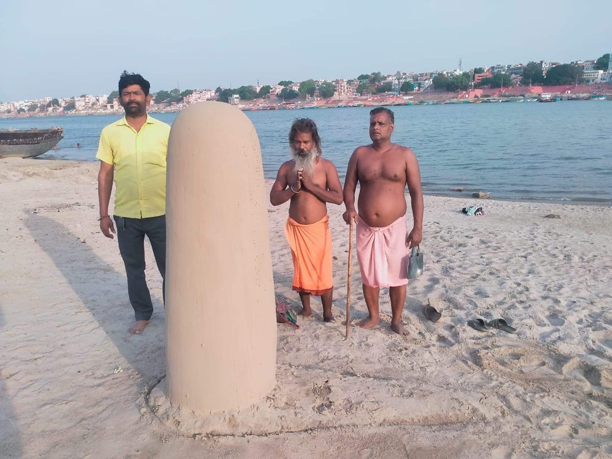 For the past six months, a five-foot-tall earthen Shivling has been taking shape every morning on the banks of the Ganges.