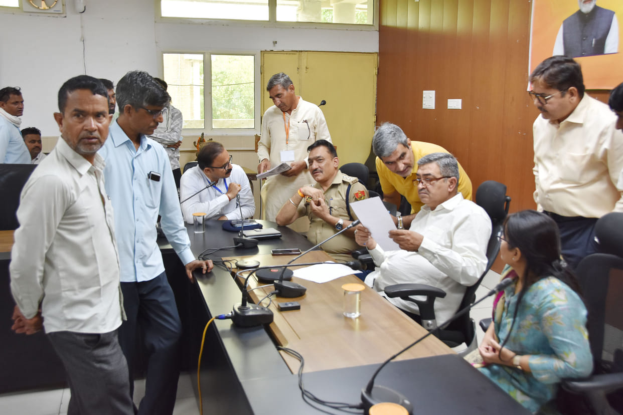 Incorrect address entry due to a technical error; unable to avail benefits of the housing scheme.