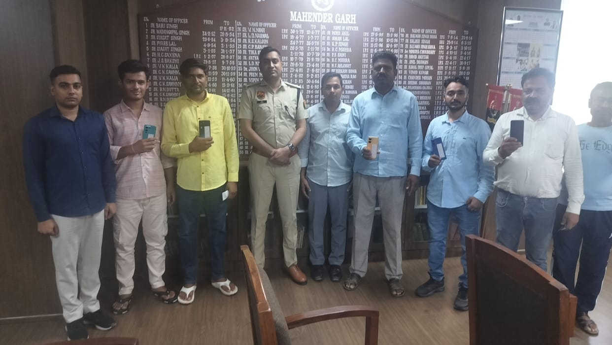 Superintendent of Police Deepak handed these phones over to their rightful owners.