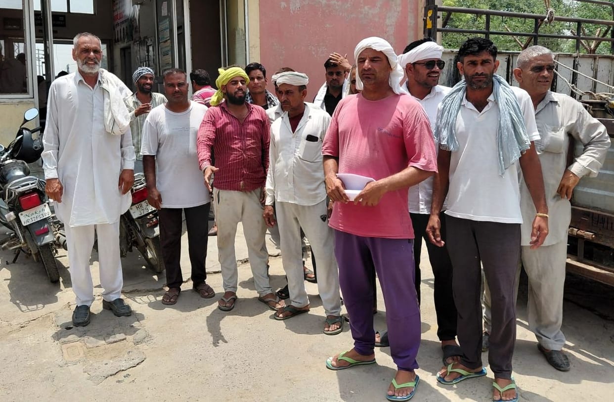 Farmers erupted in anger when power supply to their fields was disrupted and they reached the Electricity Corporation office with a lock.