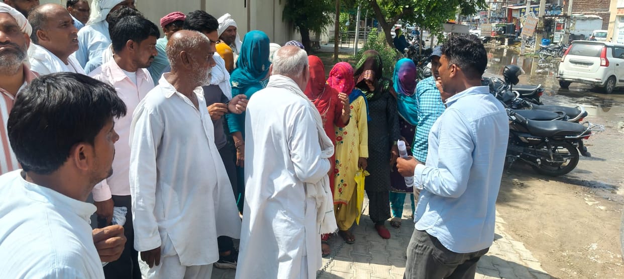 Villagers meet DC over allegations of encroachment on park land.