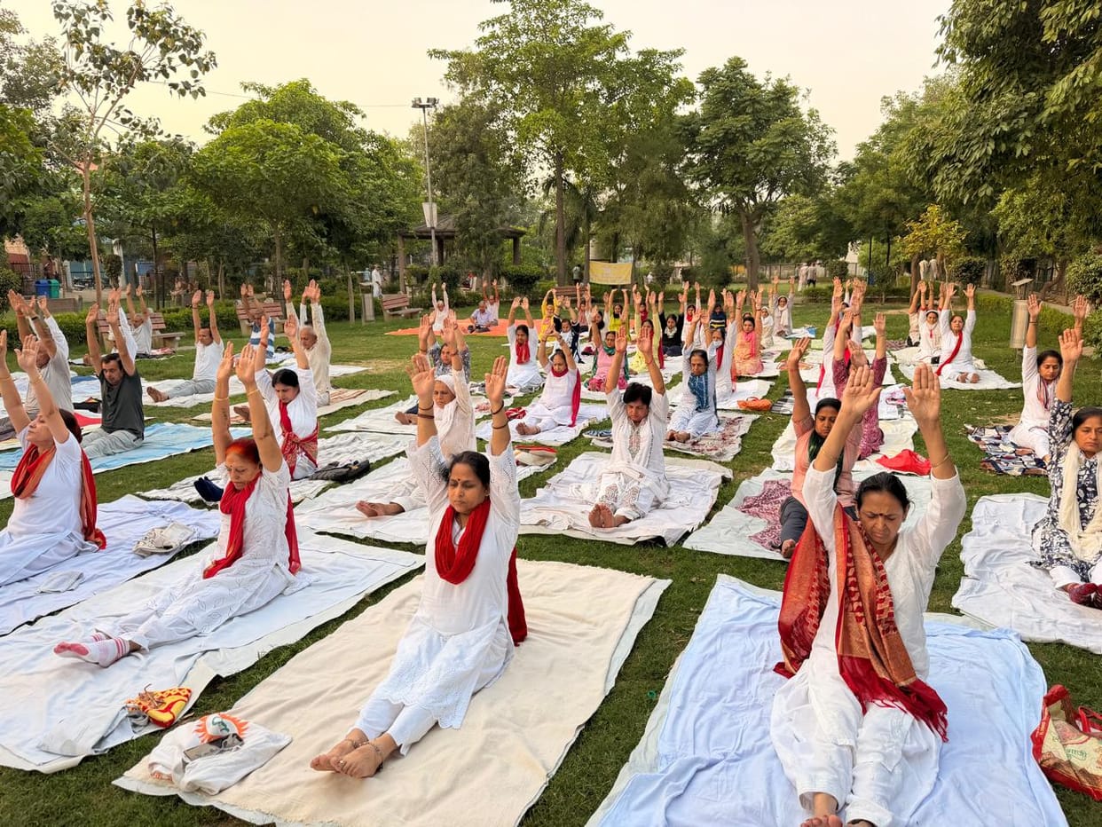 80 people practiced yoga at the obesity prevention camp.