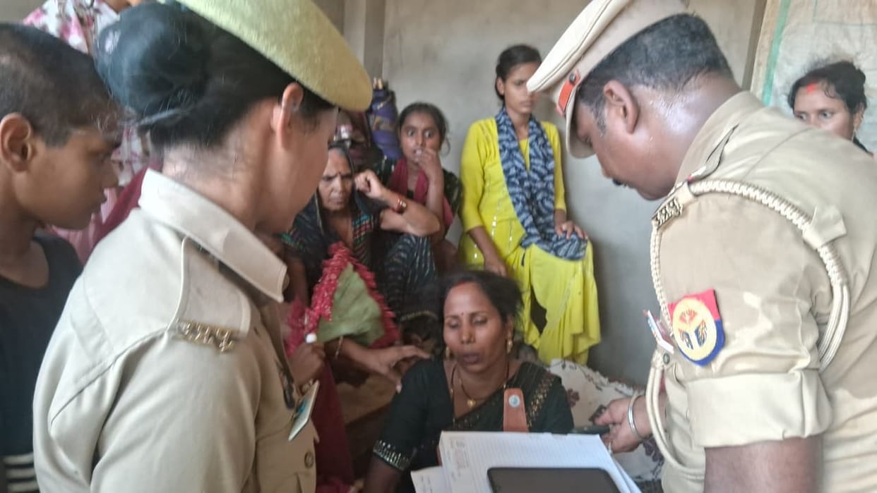 Woman's chain snatched at gunpoint of a child's temple
