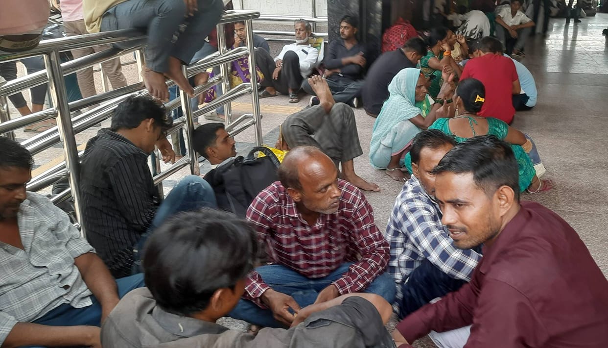 Express trains arriving late; passengers frustrated by the wait.