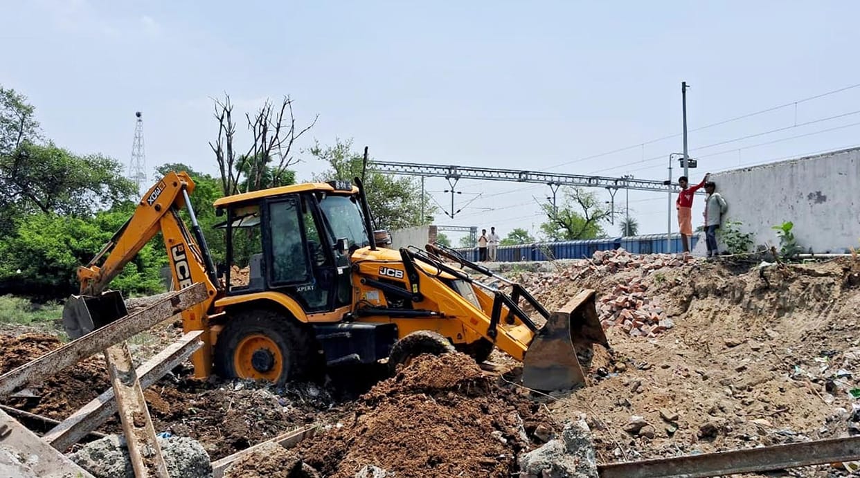 Underpass to be built near railway platform; excavation work begins.