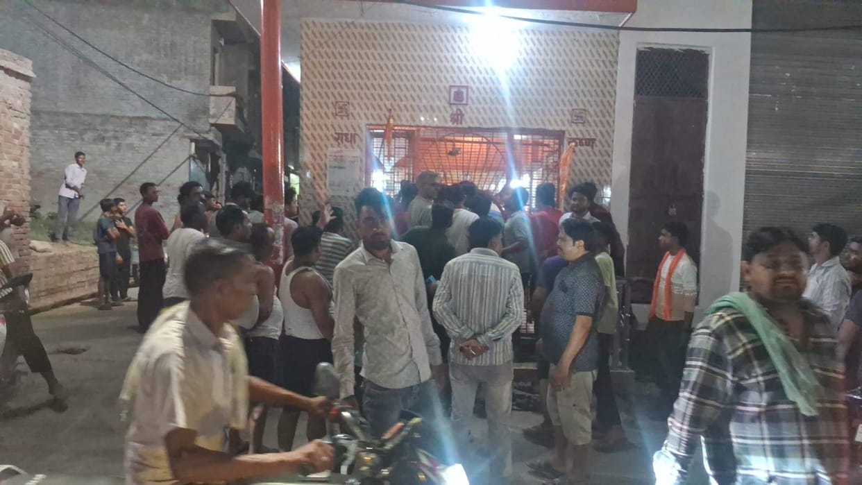 Three people caught attempting to damage an idol after entering a temple.