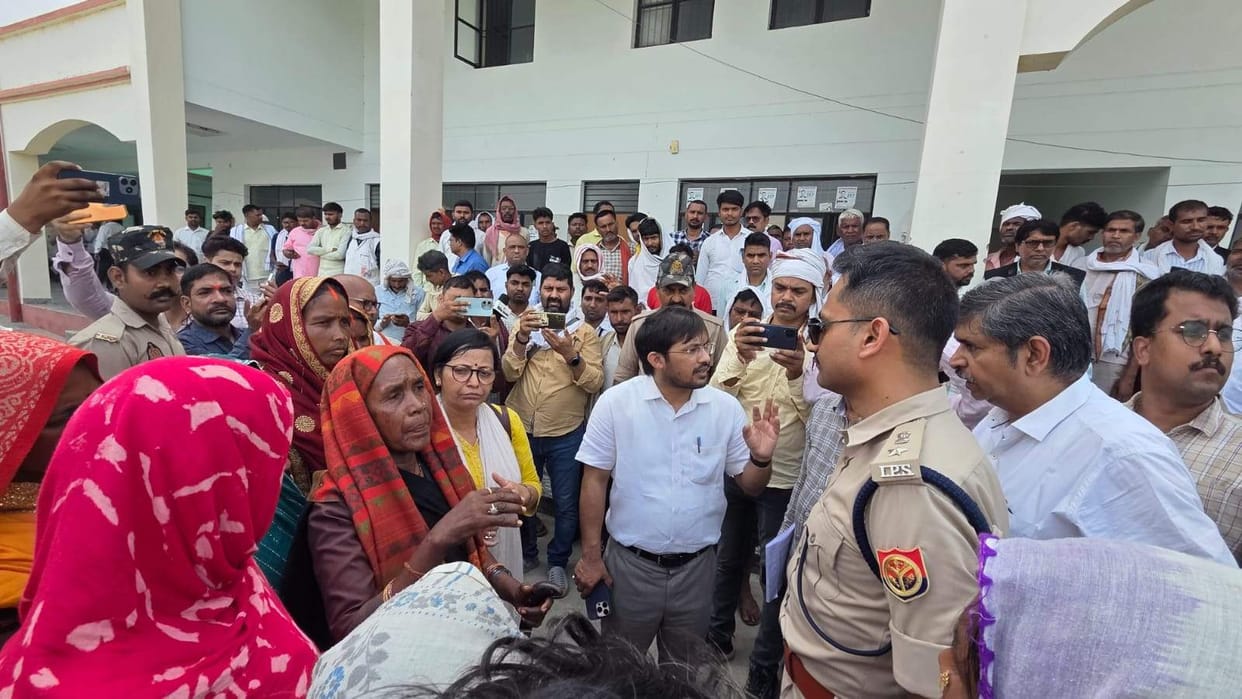 Women gheraoed the DM over roads and water supply.