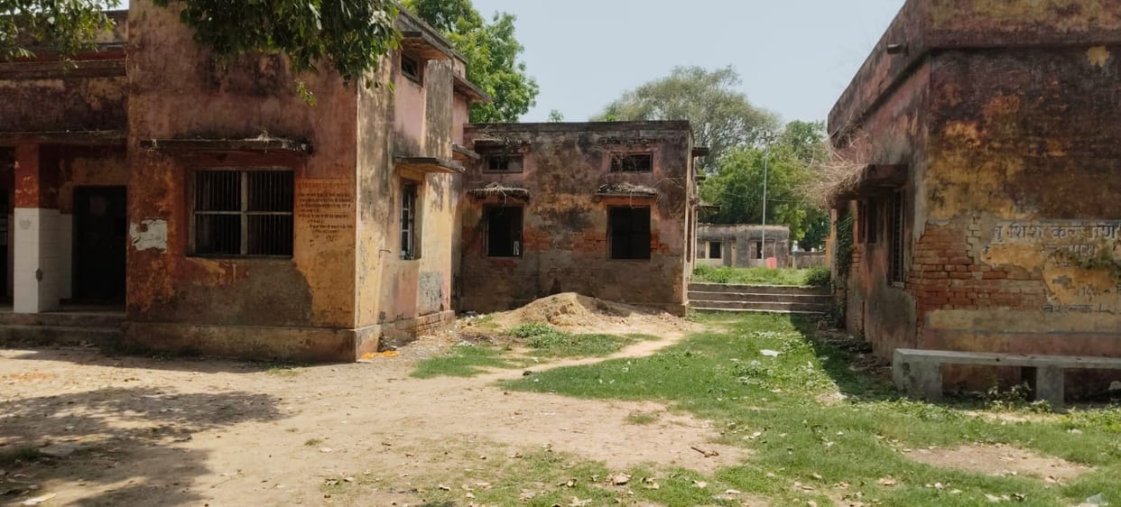 Old Primary Health Centre building in a dilapidated state.
