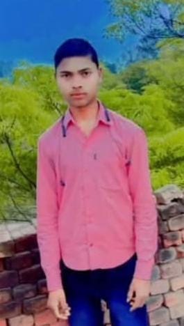 Youth dies after getting caught in thresher due to loss of balance.