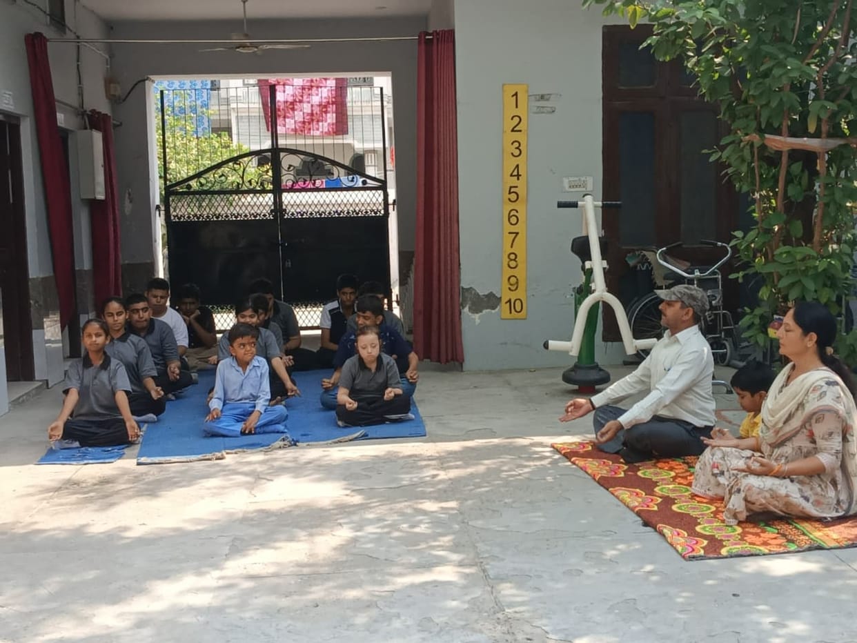 Children with disabilities practiced yoga