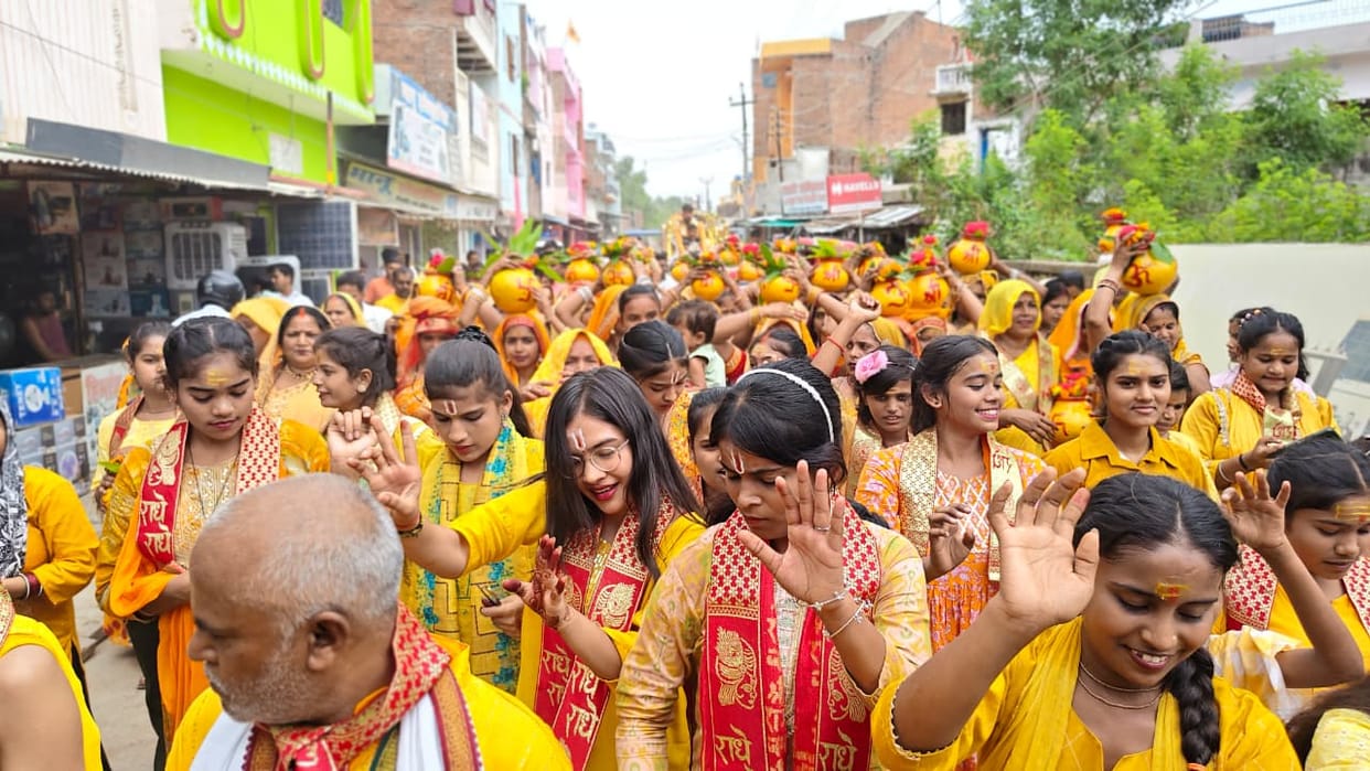Women danced during the Kalash Yatra; the discourse highlighted the glory of devotion and salvation.