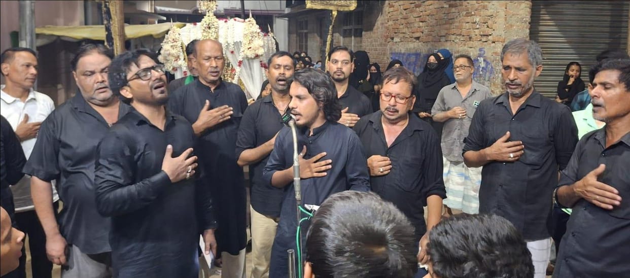 Message of harmony conveyed through the Alam and Tabut procession.