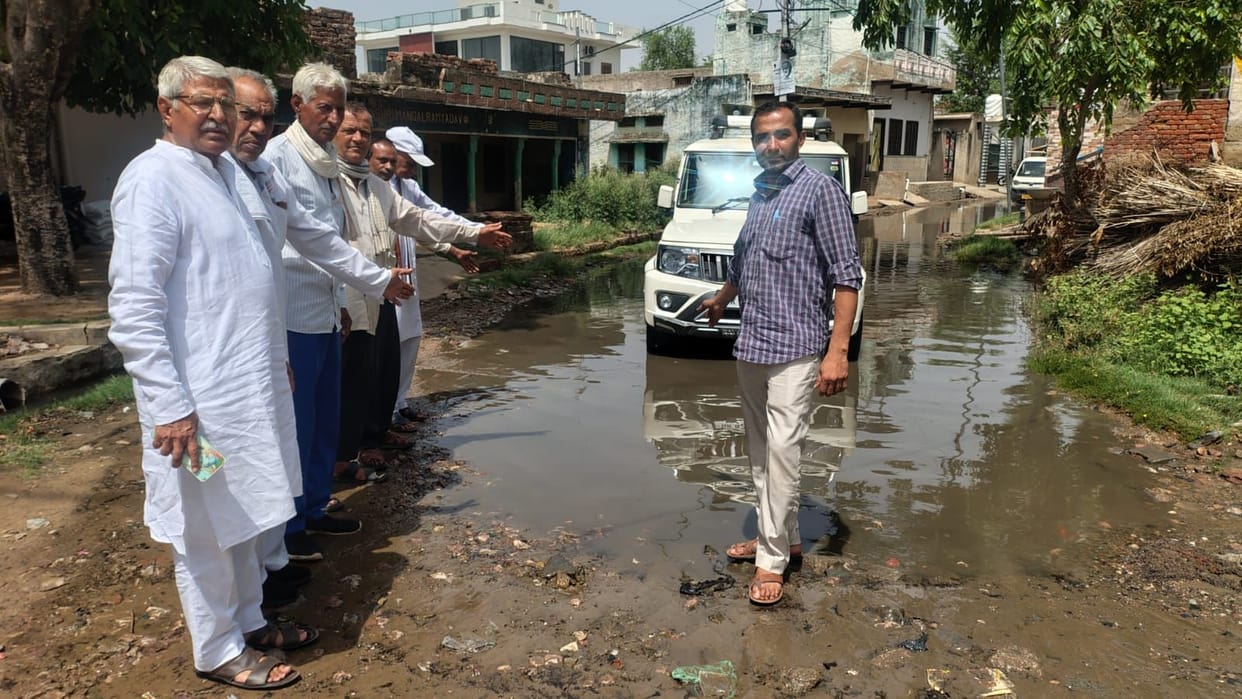 Citizens troubled by accumulation of dirty water on the main road.