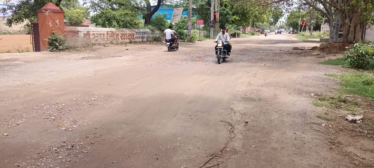 Deep pothole on the main road opposite Ramvihar Colony causes increased trouble for residents.