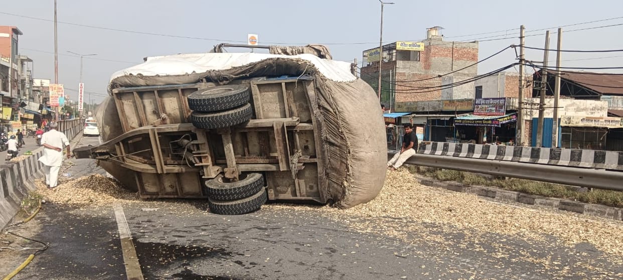Tractor-trolley loaded with wood shavings overturns in Israna.