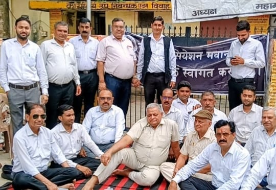 Lawyers stage a sit-in protest after locking the registry office.