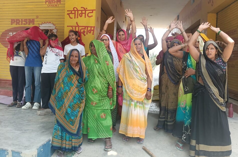 Women protest against the opening of a liquor shop near an engineering college.