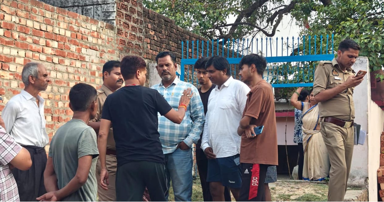Dispute over cleaning in front of the temple; police arrive.