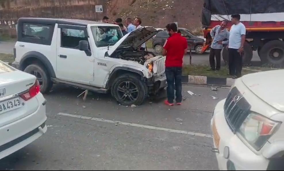 Car goes out of control on four-lane highway after tyre burst, veers into the other lane.
