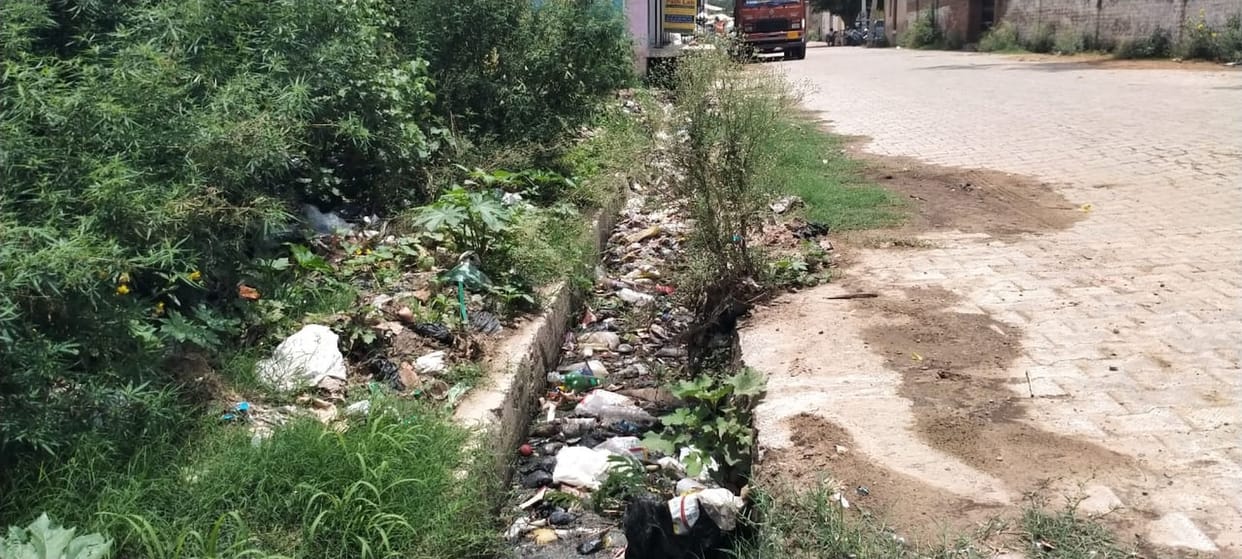 Cleanup operations exist only on paper, while the city's major drains remain choked with filth on the ground.
