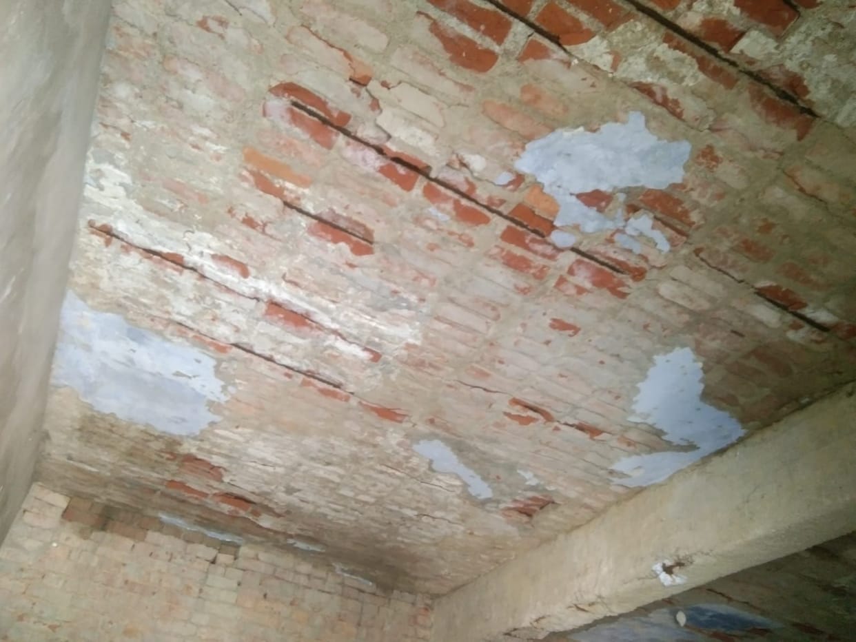 ceilings caving in, walls crumbling