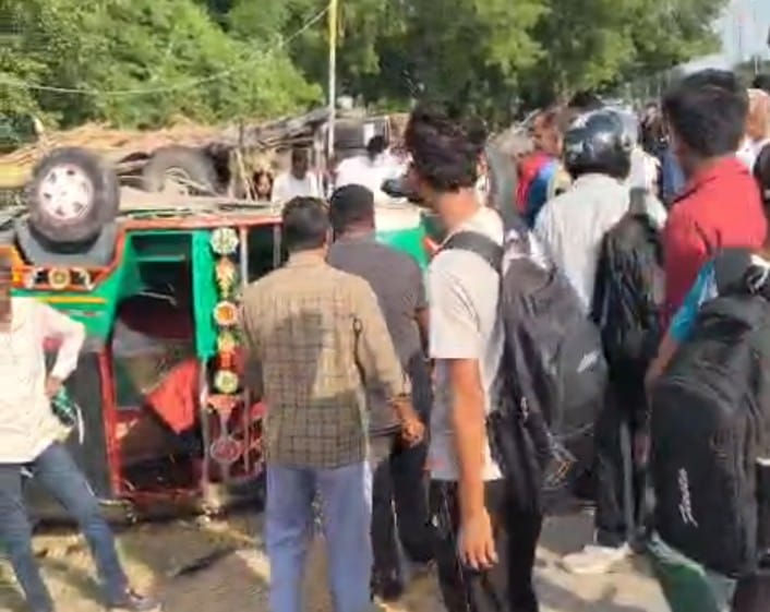 Passenger-filled auto overturns after being hit by a car; four injured