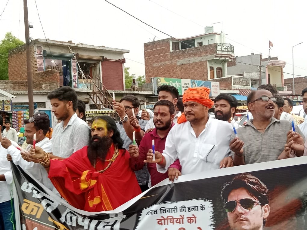 Candle march held in protest against the encounter of Bharat Tiwari