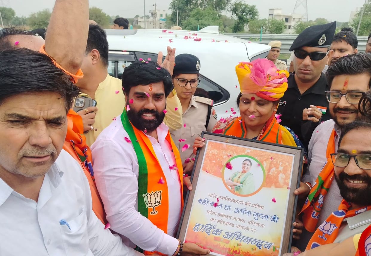 The BJP State President was honored by being presented with a turban.
