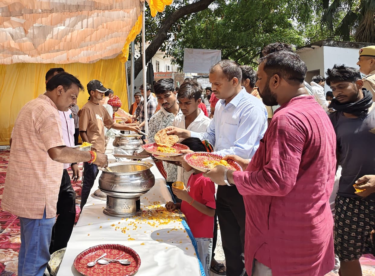 Community feasts were organized at various places, and people partook of the *prasad*.