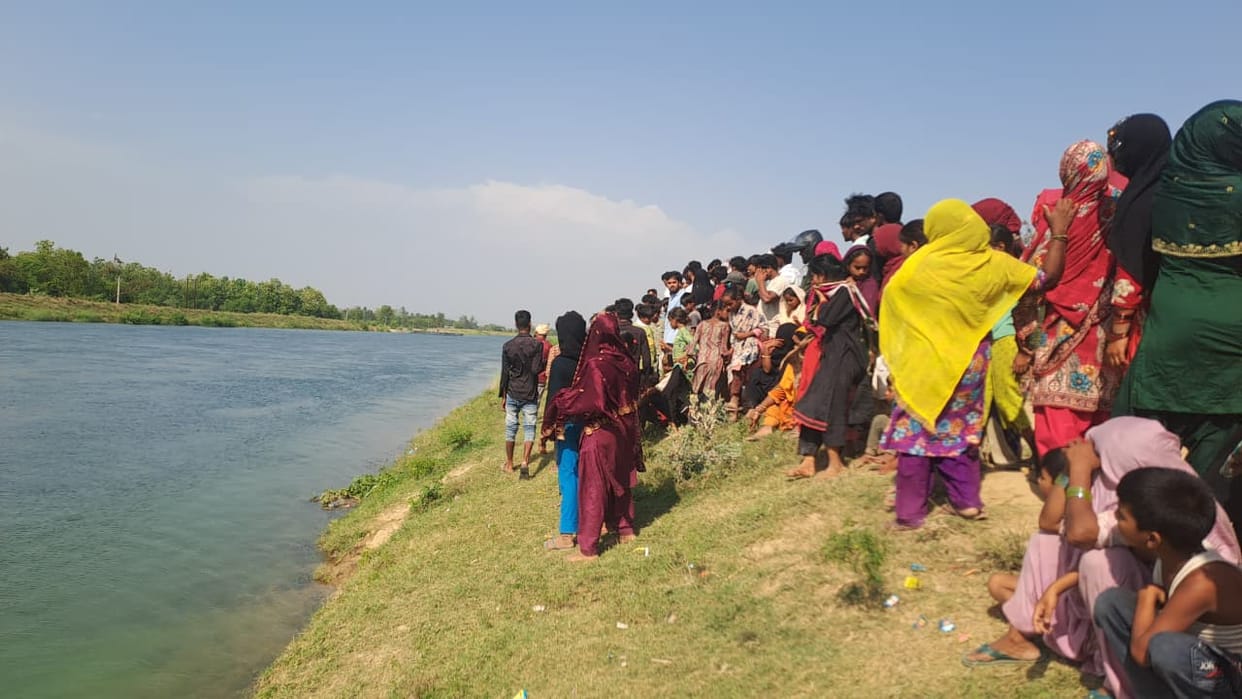 Youth drowns in canal while bathing; search underway.