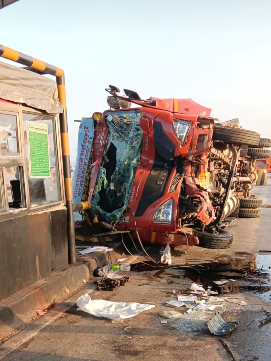 Canter overturns after hitting toll plaza booth