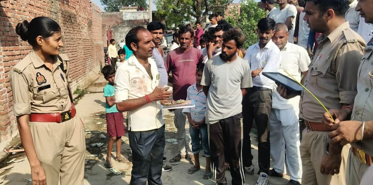 Women enraged over failure to remove shop; engaged in vandalism and poured liquor into the drain.