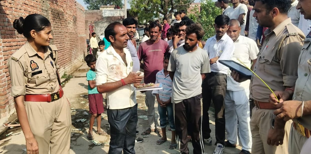 Women enraged over failure to remove shop; engaged in vandalism and poured liquor into the drain.