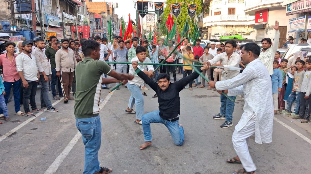 Grand mourning procession taken out on the 7th of Muharram; area echoed with chants of "Ya Hussain."