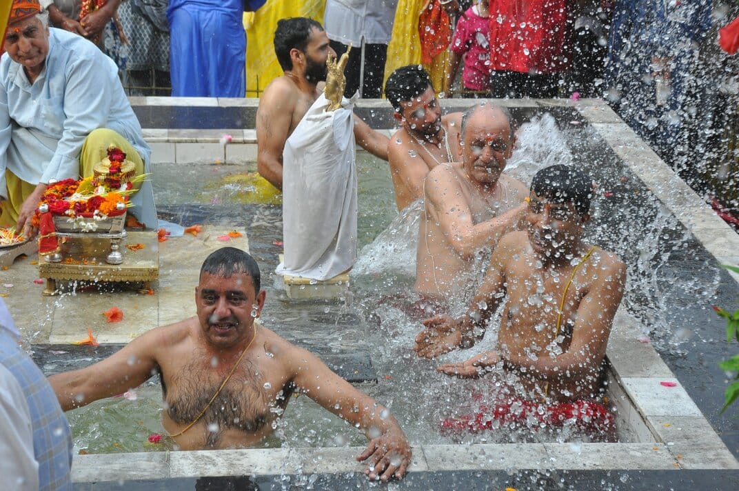 Lord Raghunath was brought out of the sanctum sanctorum and bathed.