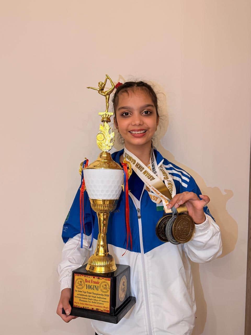 Khushi Mittal won the Asian Yoga Championship trophy