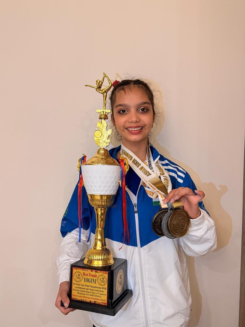 Khushi Mittal won the Asian Yoga Championship trophy
