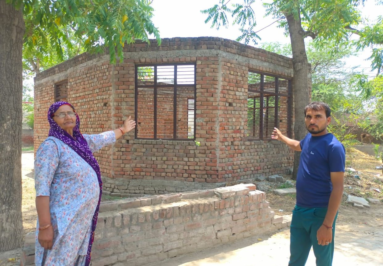 Village of international wrestlers grappling with an incomplete Panchayat building and a drinking water crisis.